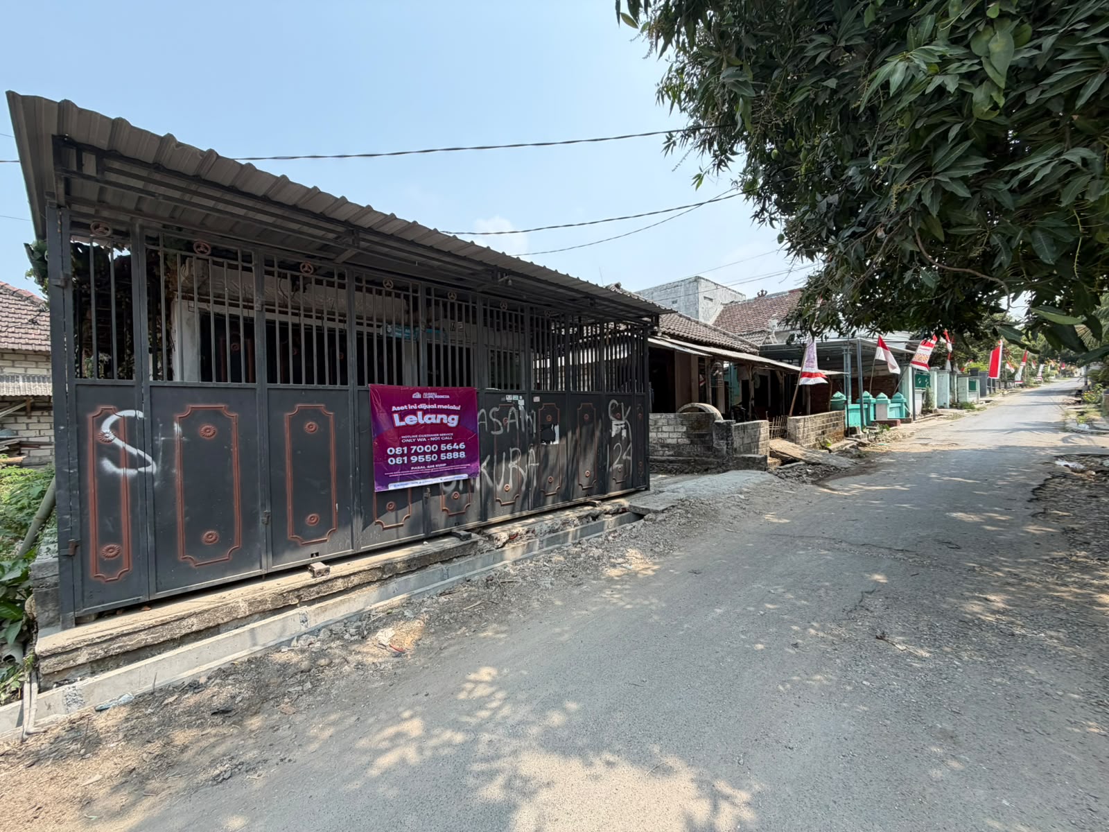AGUNAN LELANG TOKO KOMERSIAL