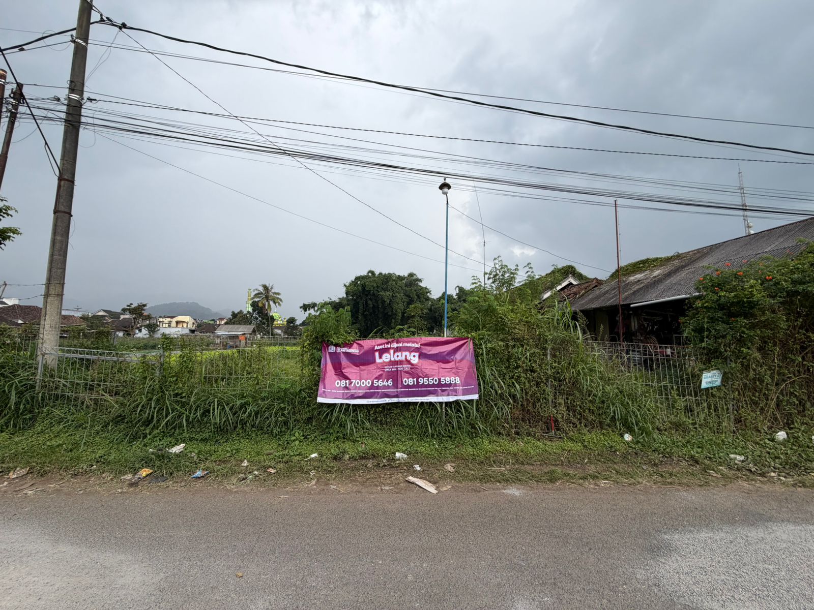 AGUNAN LELANG TANAH